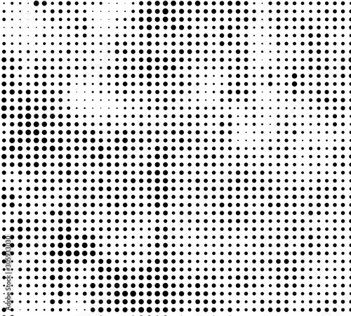 The texture of halftone. Abstract background of black dots on white