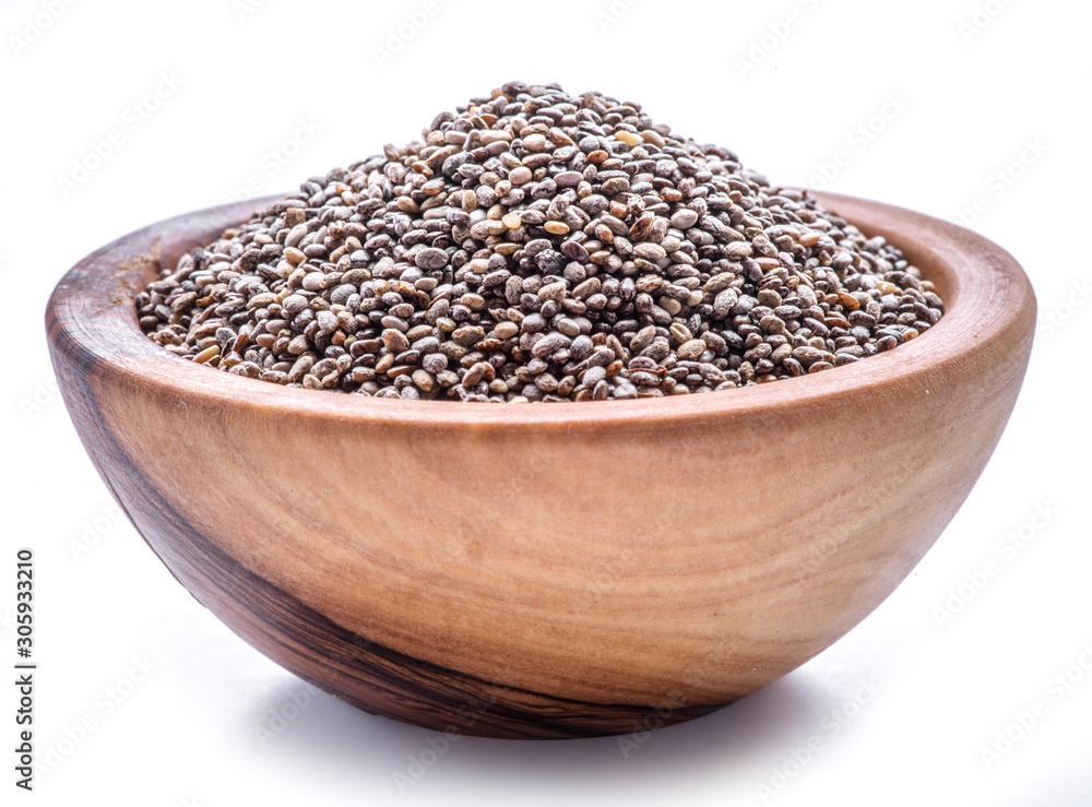 Heap of Chia seeds isolated on white background. Top view. Heap of Chia seeds isolated on white background. Top view.