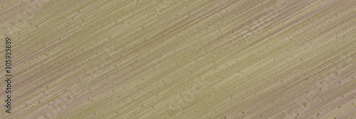 diagonal color lines background gray gray, beige and pastel brown colors. seamless repeating graphic can be used for wallpaper, background or textile fashion