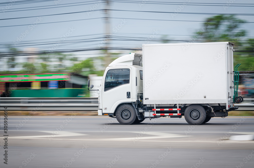 Motion image, Small white truck for logistics on the road.