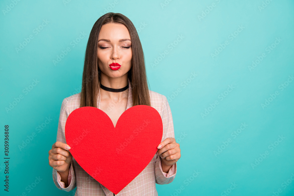 Close-up portrait of nice attractive lovable sweet tender straight-haired girl holding in hands big heart sending kiss isolated on bright vivid shine vibrant blue green turquoise color background Close-up portrait of nice attractive lovable sweet tender straight-haired girl holding in hands big heart sending kiss isolated on bright vivid shine vibrant blue green turquoise color background