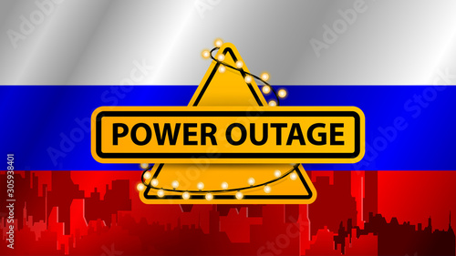 Power outage, yellow warning sign wrapped with garland on the background of the flag of Russia with the silhouette of the city on the background