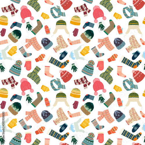 Seamless cozy pattern with warm clothes like hats,  socks and mittens, gloves, scarf on whiteback