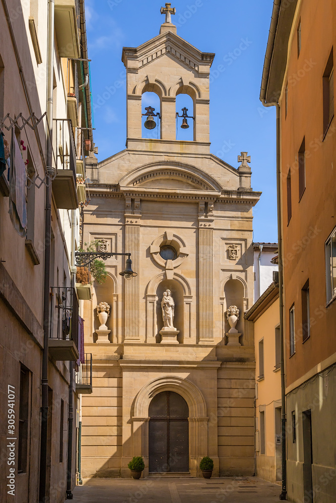 Pamplona, Spain. Facade of the church with a bell tower