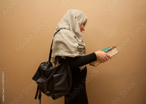 Middle eastern girl getting ready for school