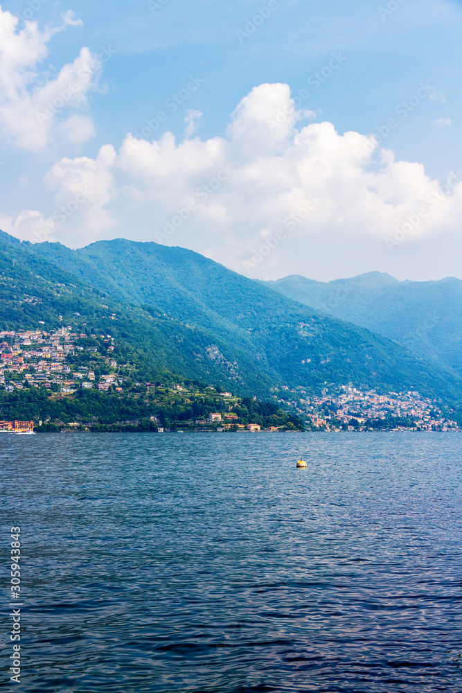 Picturesque Lake Como May view with a buoy
