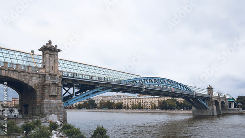 Glazed pedestrian bridge over the Moscow river.
