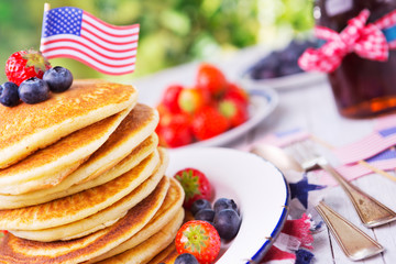 Stack of pancakes with fresh fruit