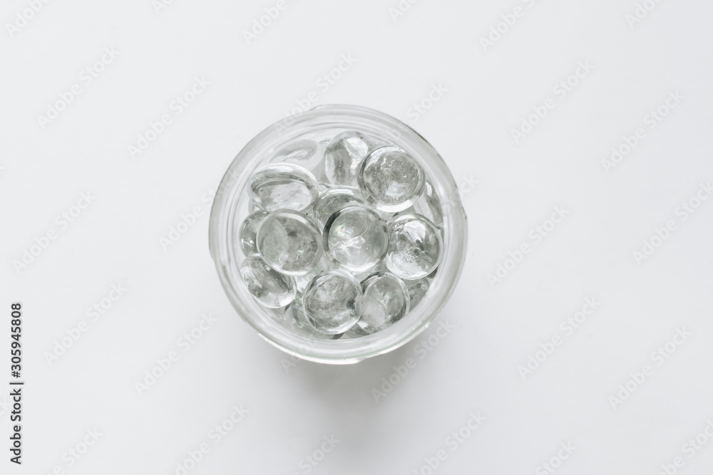 Scattered crystals on white background, beautiful gems Scattered crystals on white background, beautiful gems