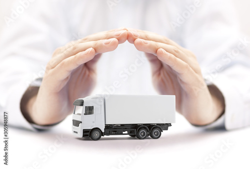 Cargo delivery truck protected by hands