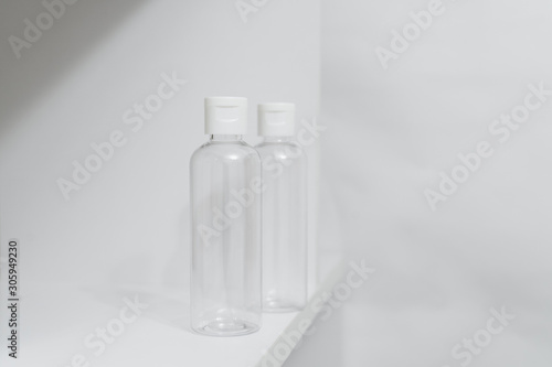 Plastic bottles on white background 