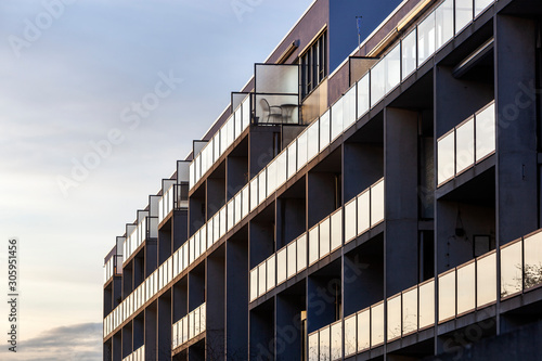 Balconies of a concrete condominium with glass balustrades in Rotterdam Prinsenland in the Netherlands