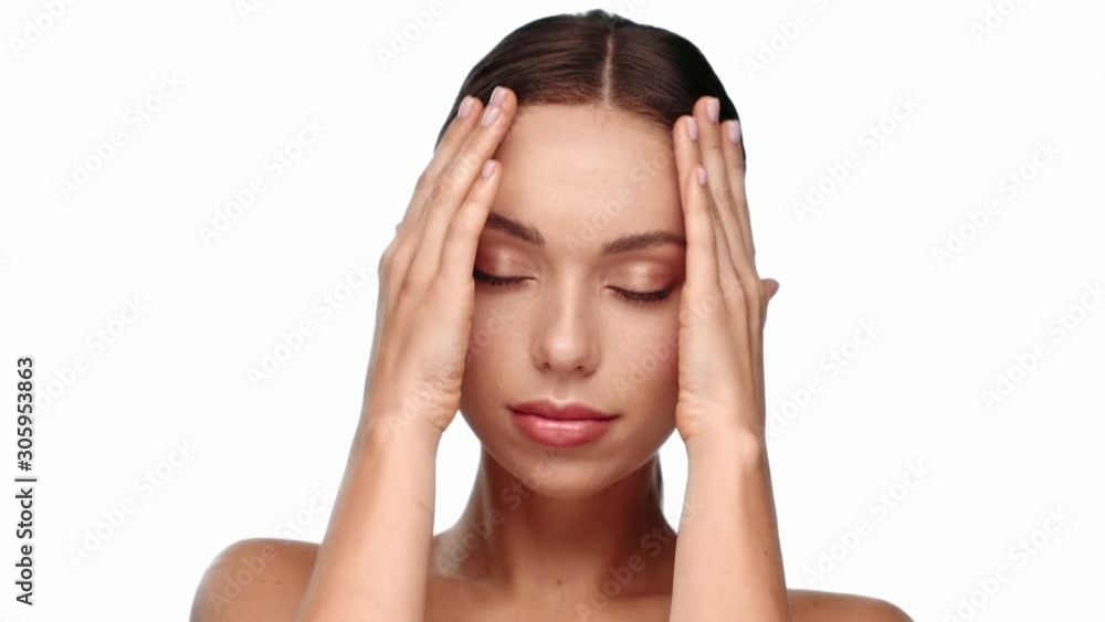 woman with closed eye touching face isolated on white woman with closed eye touching face isolated on white