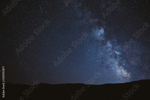 Obraz na płótnie Astrophotography. Milky way with mountains silhouette w salonie