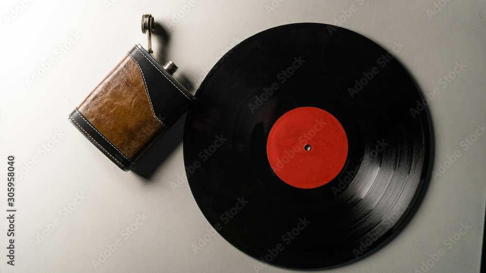 Fototapeta premium a flask and vinyl record