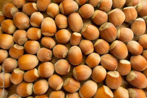 Schilderij op canvas Background - group of ripe hazelnuts from above