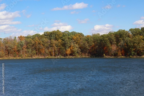 A colorful peaceful day at the lake on a sunny fall day.