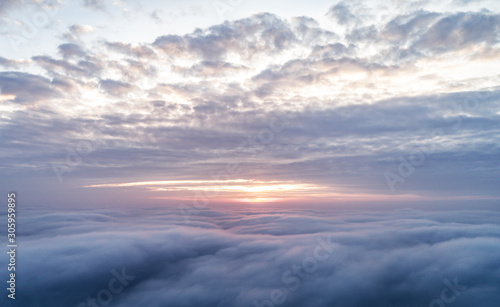 Cloud. Flying over the clouds. Photo taken from a drone. © Denis Rozhnovsky