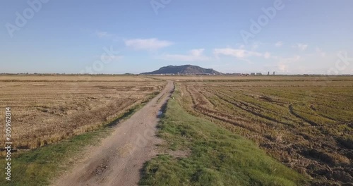 Drone shot over reaped fields season. Valencia, Spain