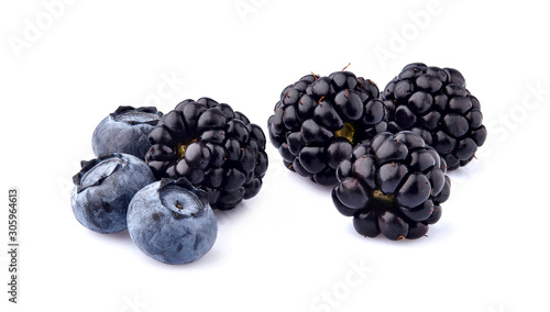Black berries Isolated on White Background. Macro. Blueberries and blakberries isolated.