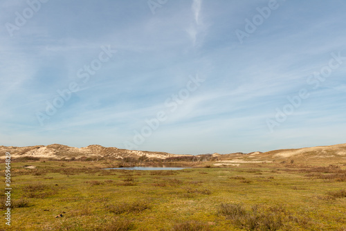View of a wet dune valley with water