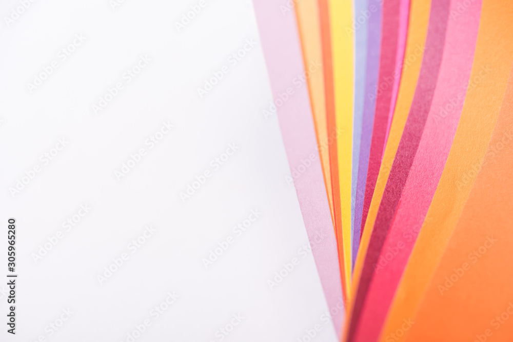 top view of colorful and bright papers isolated on white top view of colorful and bright papers isolated on white