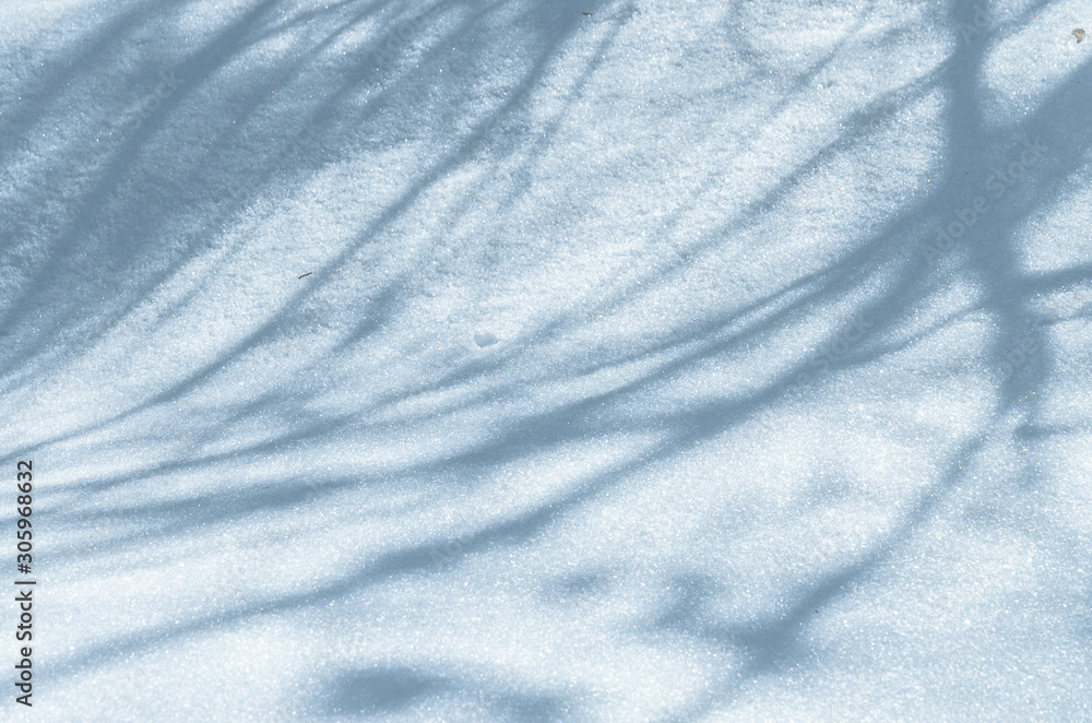 Snowdrift background with shadow of trees Snowdrift background with shadow of trees