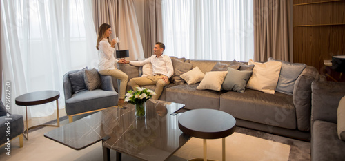 Young couple relaxing and t...