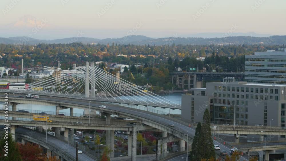 Wide shot of the Tilikum Crossing Bridge and Ross Island Bridge in Portland, Oregon