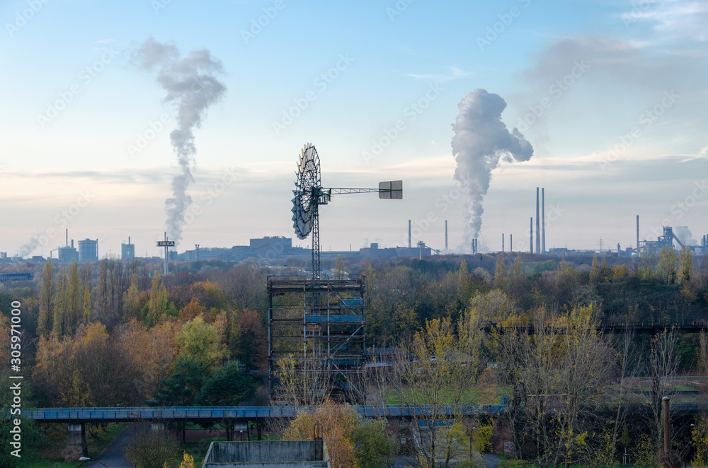 Industrial surroundings at sunset and night