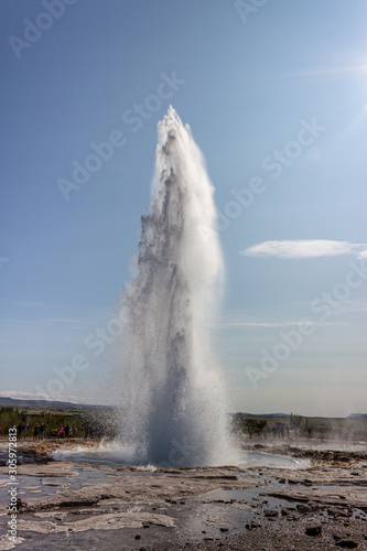 Icelandic geyser eruption and blue sky Strokkur, Big geyser in action outbreak, explosion