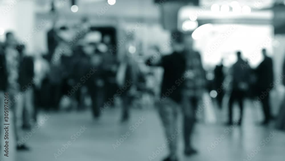 Background blur people inside and walking in a shopping mall Background blur people inside and walking in a shopping mall