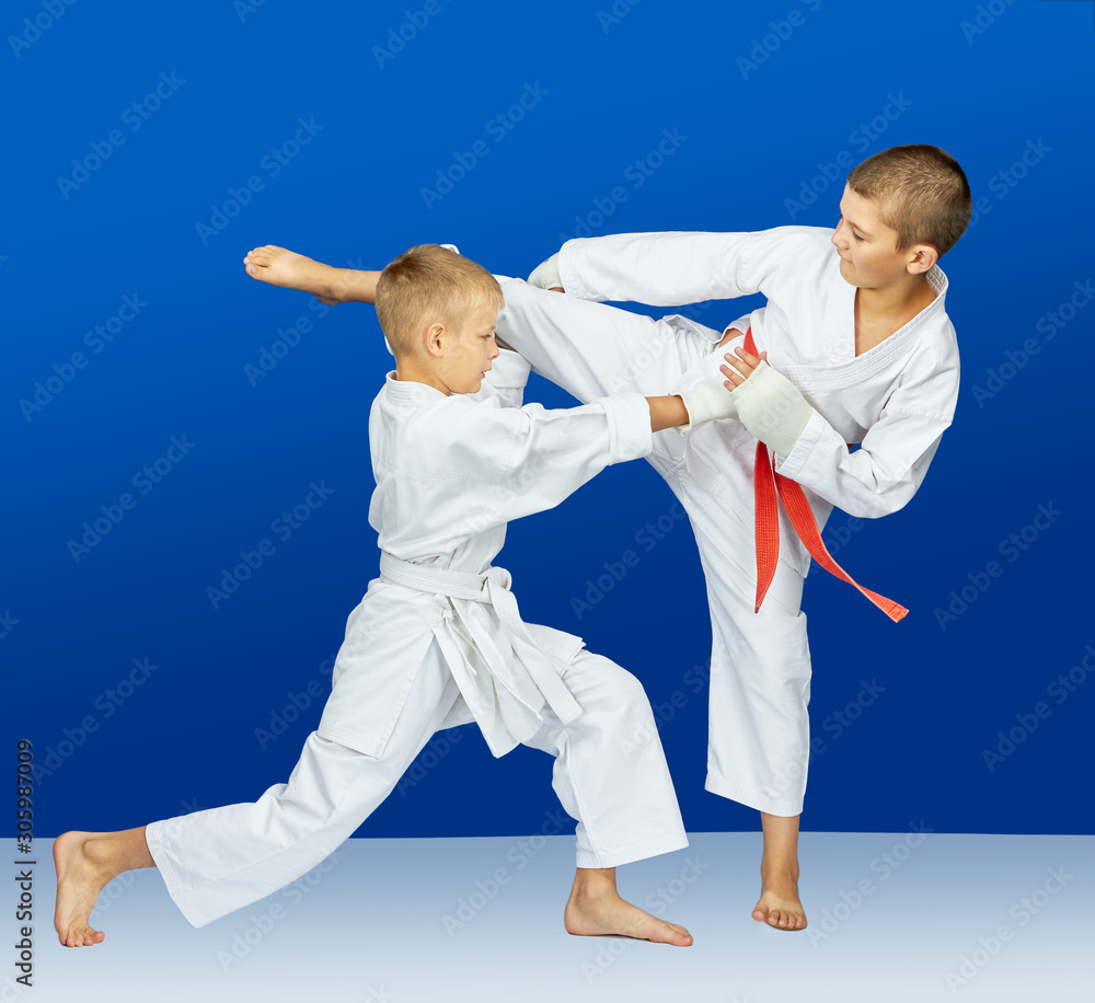 With white overlays on the hands the athletes are training blows With white overlays on the hands the athletes are training blows