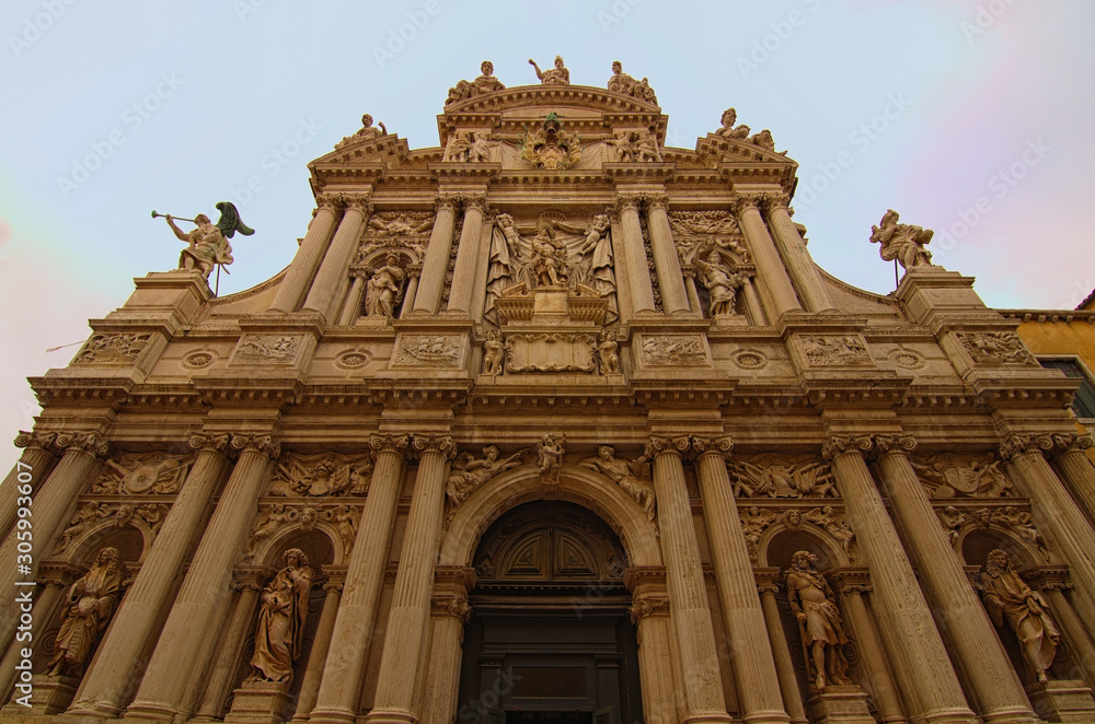 Wide-angle view of the finest Venetian Baroque facade of the Church of Santa Maria Zobenigo. It is one the oldest (founded in the IX century) churches in Venice. It was rebuilt between 1678 and 1681