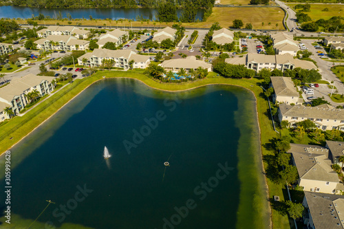 Aerial photo pond in a residential housing community Homestead FL USA