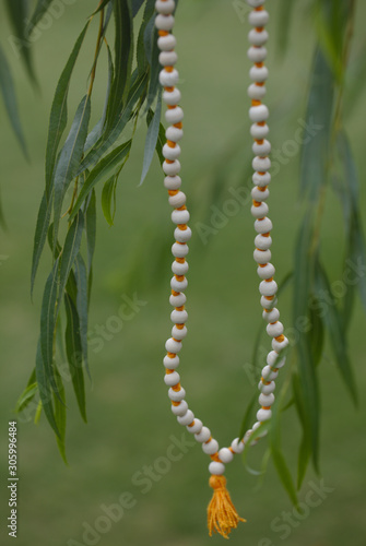 NB__7202 Spiritual welcome necklace with white beads and orange fringes