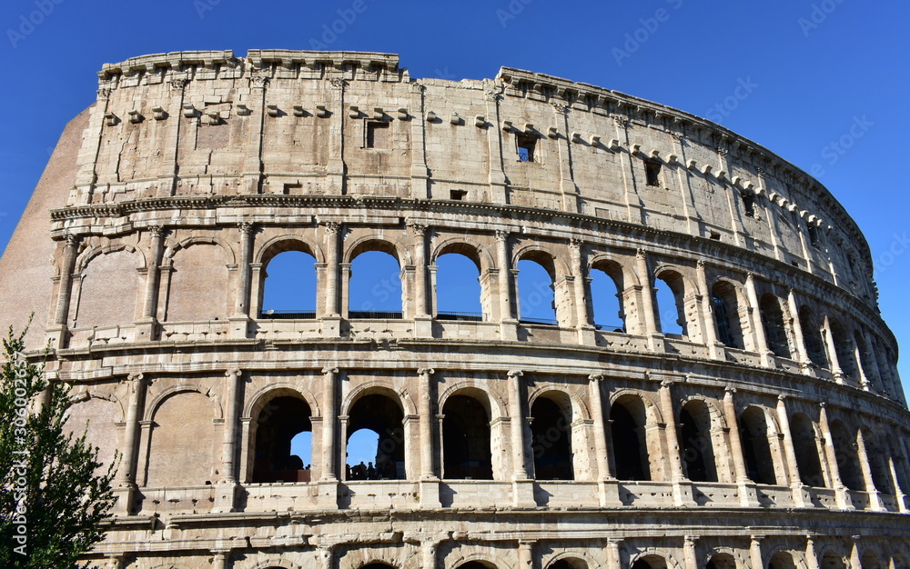 Colosseo with blue sky. Rome, Italy.