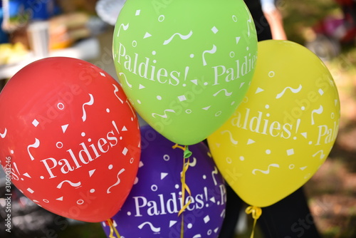 Multi-colored air balloons. The inscription in Latvian PALDIES means - Thank you! photo