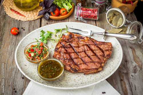 Tenderloin steak on plate with sauce