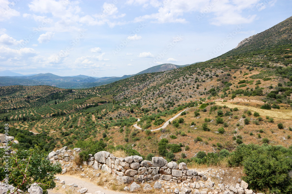 Amazing view to the valley from the ruins of citadel of ancient greek city Mycenae