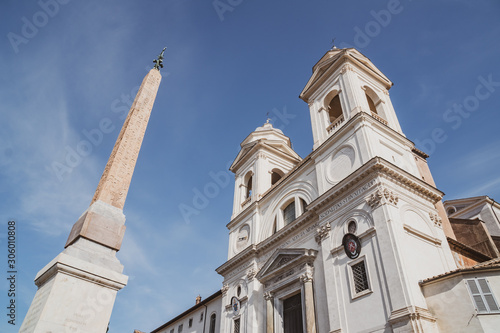 Santissima Trinita dei Monti church and Ancient Egyptian obelisk at the top of the Spanish steps in Rome.