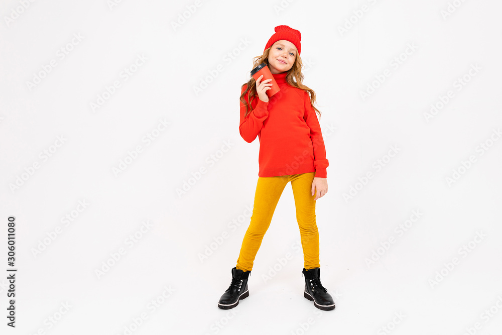 European cute girl in red posing with a glass of coffee in her hands over white background European cute girl in red posing with a glass of coffee in her hands over white background