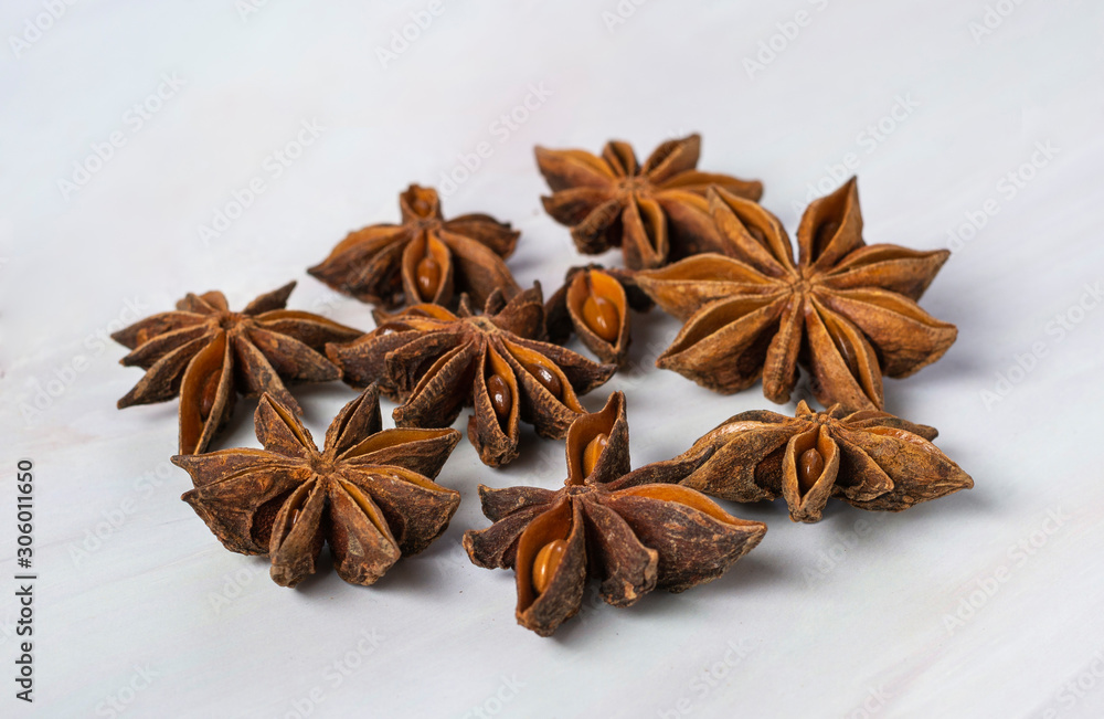 Star anise in closeup, isolated on white background Star anise in closeup, isolated on white background