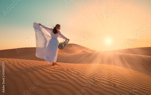 UAE. Woman in desert