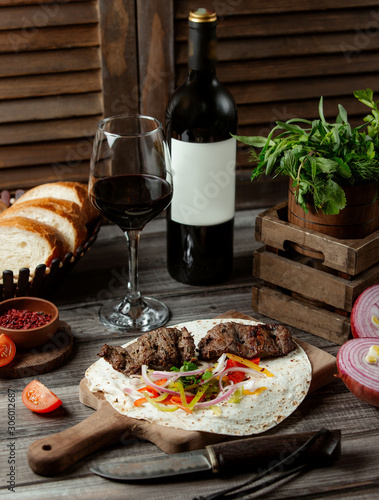 fried meat kebab with red wine