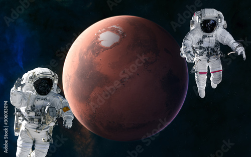 Astronauts, red planet. Mars, the solar system. Science fiction. Elements of this image furnished by NASA