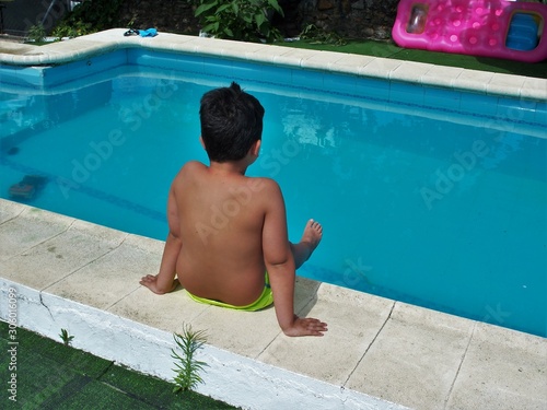 A boy in the pool.