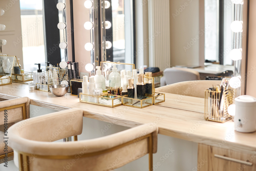 Dressing room interior with makeup mirror and table. Place for applying makeup Dressing room interior with makeup mirror and table. Place for applying makeup