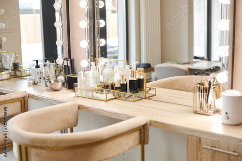 Dressing room interior with makeup mirror and table. Place for applying makeup