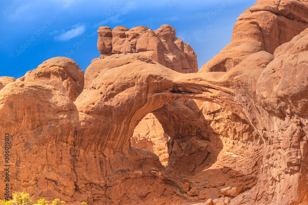 Fototapeta premium Double arches, Arches National Park, adjacent to the Colorado River, Moab, Utah, USA